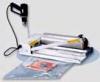 1- CELLOPHANEUSE MRC-300IP™ "Kit Compact" avec film et pistolet 1- CELLOPHANEUSE MRC-300IP™ "Kit Compact" avec film et pistolet